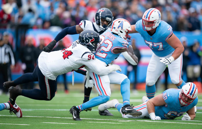 Tennessee Titans running back Tyjae Spears (32) runs against the Houston Texans during their game at Nissan Stadium in Nashville, Tenn., Sunday, Dec. 17, 2023